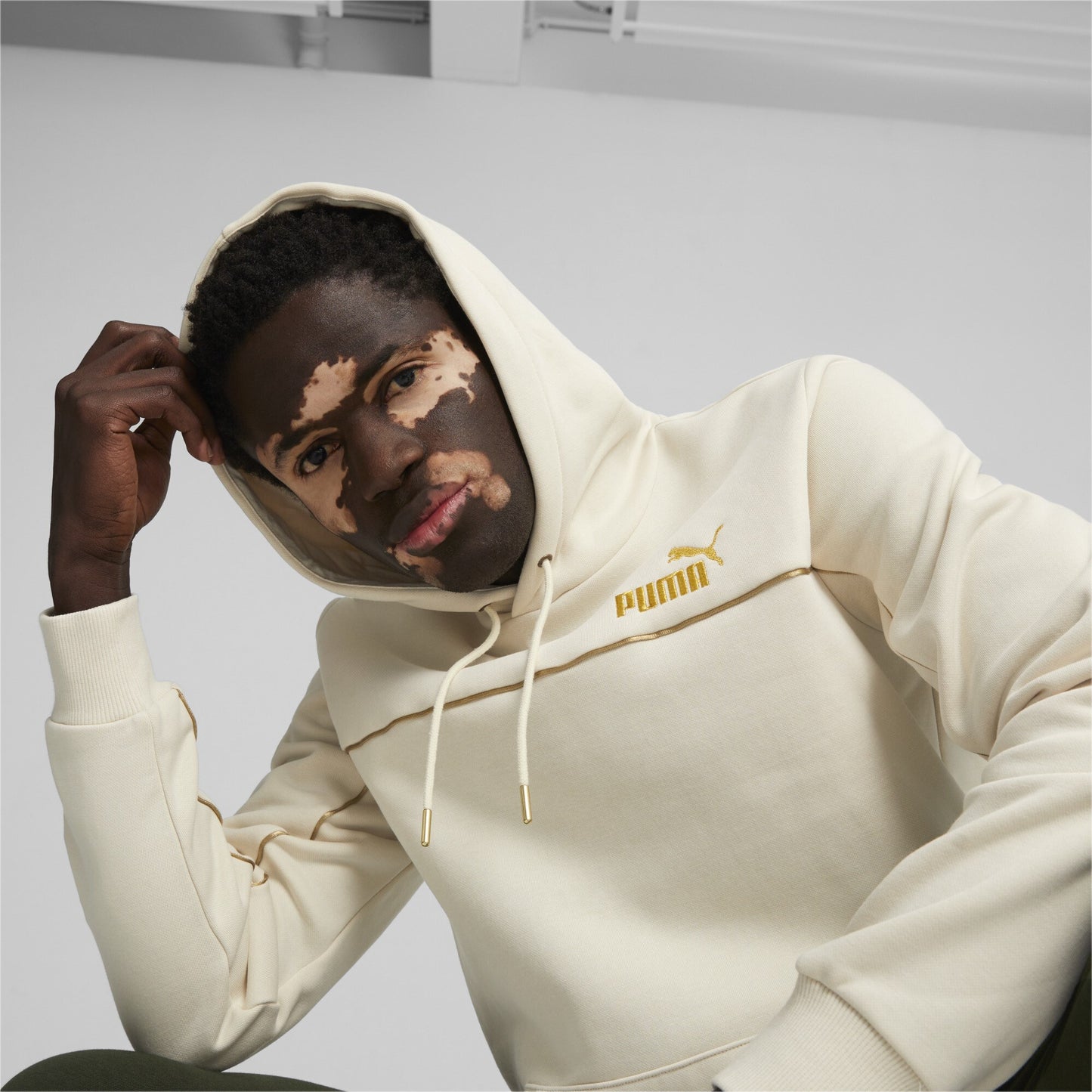 Felpa Ess+ Minimal Gold Hoodie Fl Puma